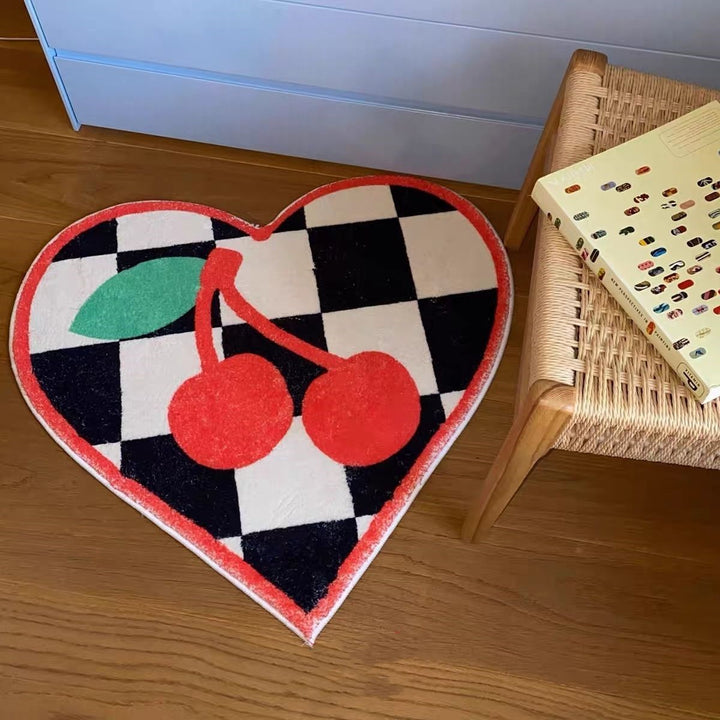 VibeCore Cherry Chessboard Accent Rug, combining playful cherry designs with classic chessboard patterns. Soft, fluffy texture with a non-slip backing, perfect for adding comfort and a trendy twist to any room. Durable, easy to clean, and ideal for living rooms, bedrooms, or dorms.