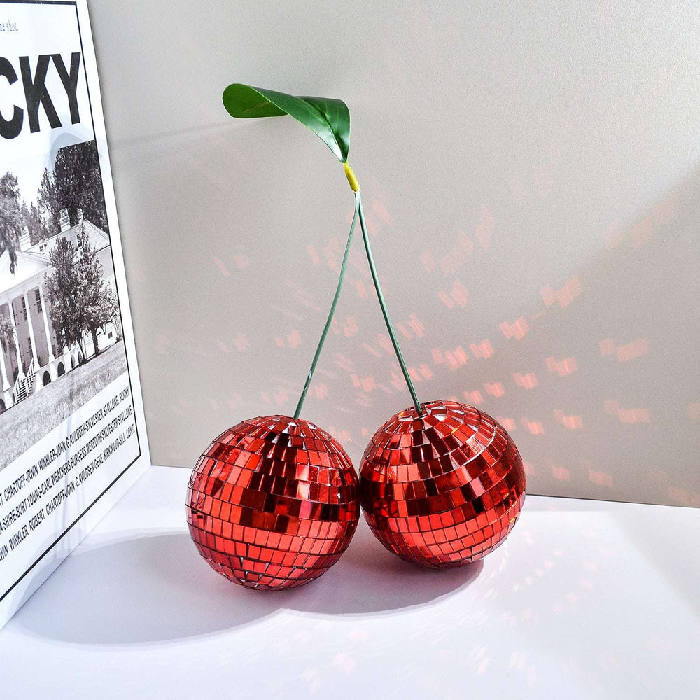 VibeCore Cherry Disco Ball Red, featuring a vibrant, geometric design with a dazzling mosaic finish made from handcrafted embroidered glass, adding playful charm and eye-catching elegance to any room.