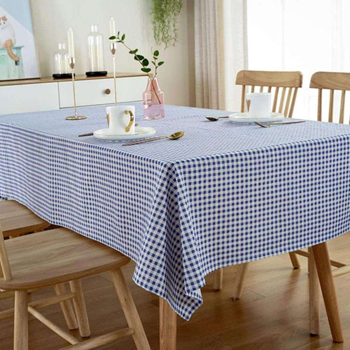 VibeCore Classic Picnic Plaid Tablecloth blue front view, featuring a vibrant plaid design, waterproof, fade-resistant fabric, ideal for enhancing your table setting at any gathering.