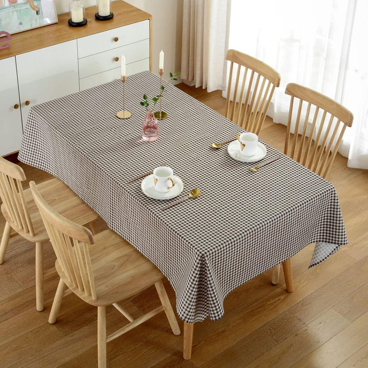 VibeCore Classic Picnic Plaid Tablecloth brown top view, displaying a vibrant plaid pattern, waterproof, fade-resistant fabric, perfect for adding style to any gathering or event.