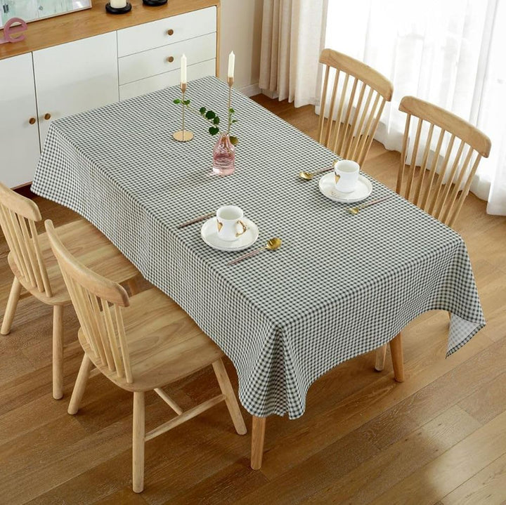 VibeCore Classic Picnic Plaid Tablecloth dark green top view, displaying a vibrant plaid pattern, waterproof, fade-resistant fabric, perfect for adding style to any gathering or event.