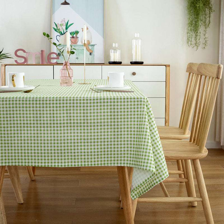 VibeCore Classic Picnic Plaid Tablecloth green side view, showcasing a vibrant plaid design, waterproof, fade-resistant fabric, and perfect for stylish gatherings.