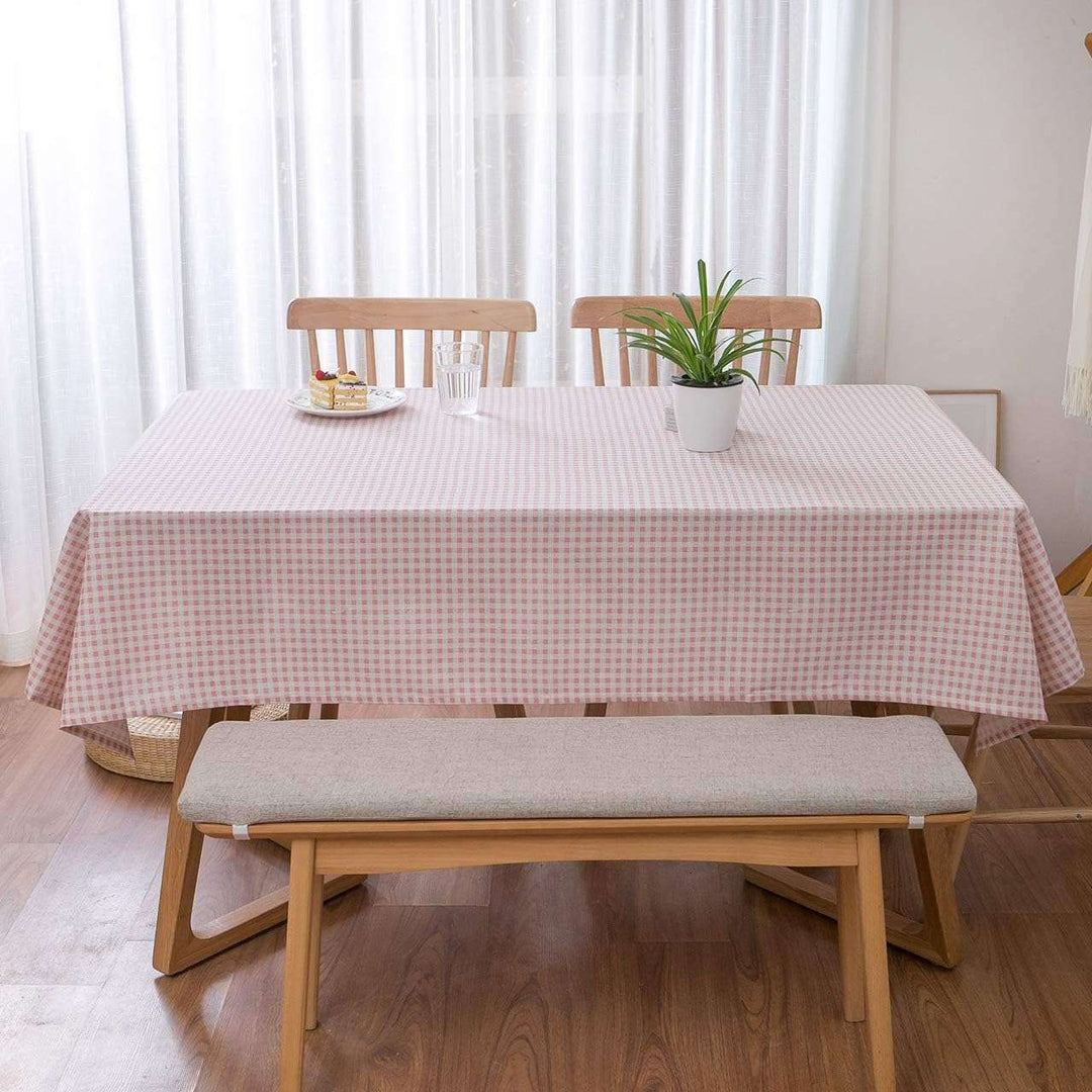 VibeCore Classic Picnic Plaid Tablecloth light pink front view, featuring a vibrant plaid design, waterproof, fade-resistant fabric, ideal for enhancing your table setting at any gathering.