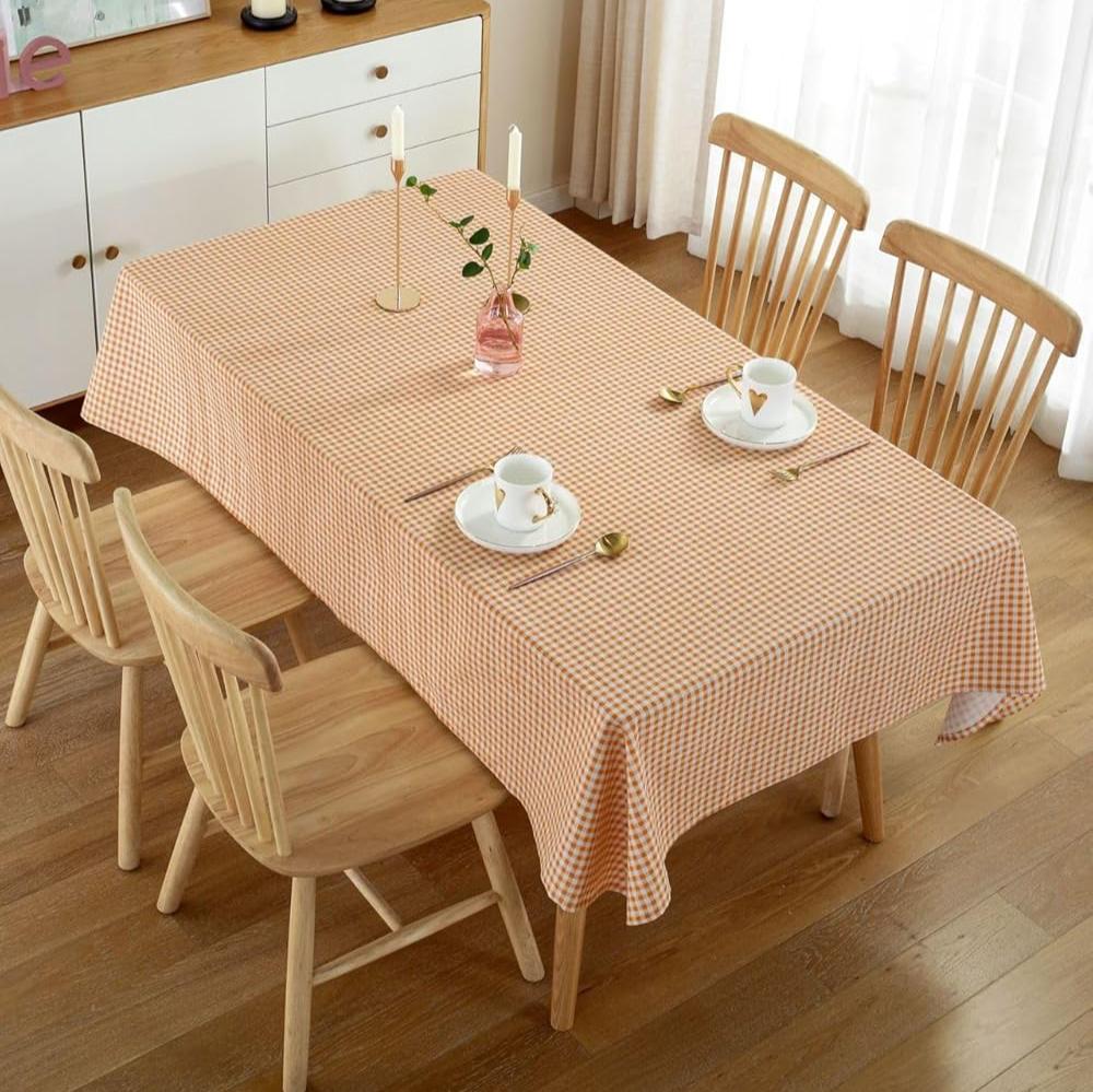 VibeCore Classic Picnic Plaid Tablecloth orange top view, displaying a vibrant plaid pattern, waterproof, fade-resistant fabric, perfect for adding style to any gathering or event.