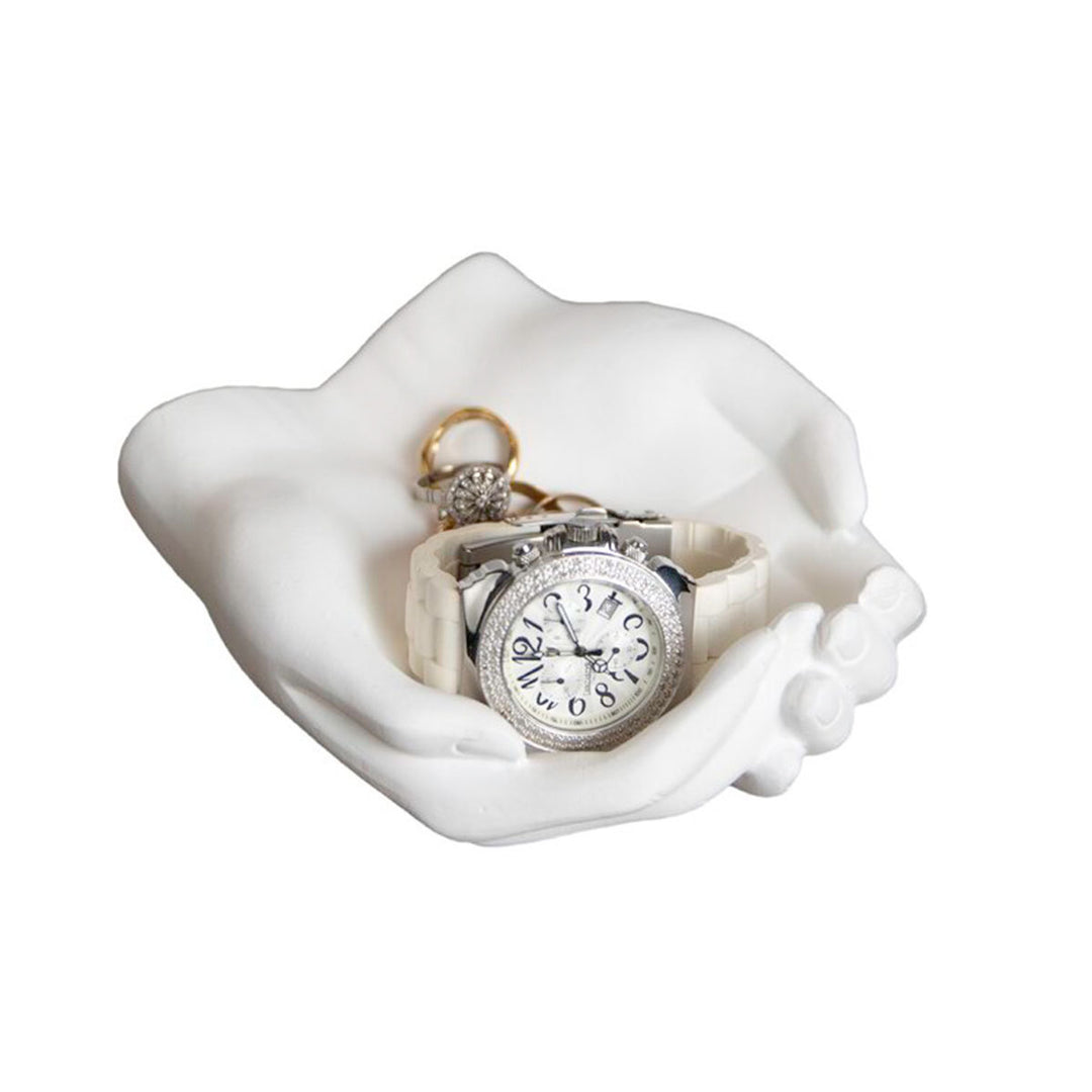 VibeCore Closed Hands Display Tray viewed from the front, showcasing its unique closed hands shape in elegant white, designed to hold small items like jewelry or keys.