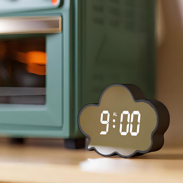 VibeCore Cloud Mirror Alarm Clock Black on floor, featuring a modern, minimalist design with temperature display, adjustable brightness, energy-saving mode, and dual-function mirror feature.