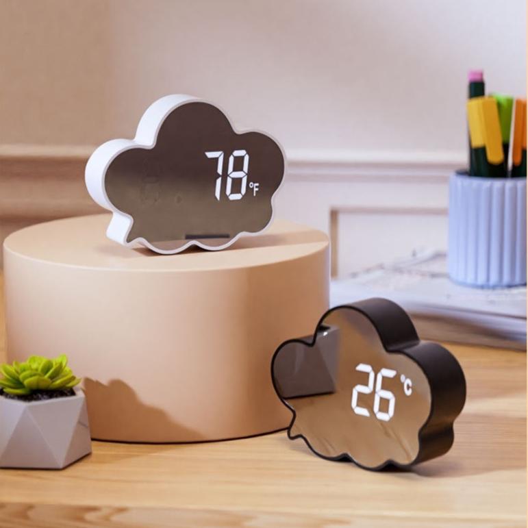 VibeCore Cloud Mirror Alarm Clock White and Black on table, featuring sleek minimalist designs with adjustable brightness, temperature display, and dual-function mirror feature for modern spaces.