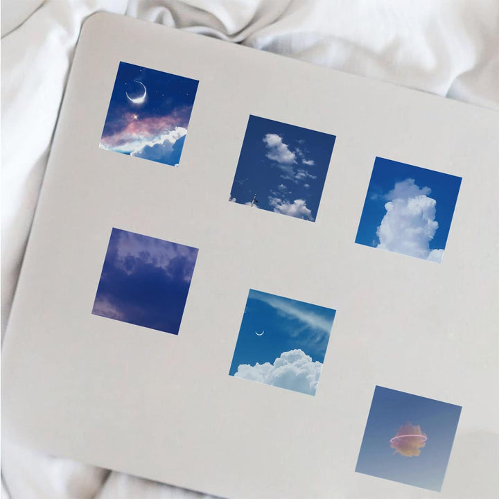VibeCore Cloudy Skies Stickers applied to the back of a notebook, featuring soft, fluffy cloud designs and dreamy skies, adding a serene, aesthetic touch to your stationery.