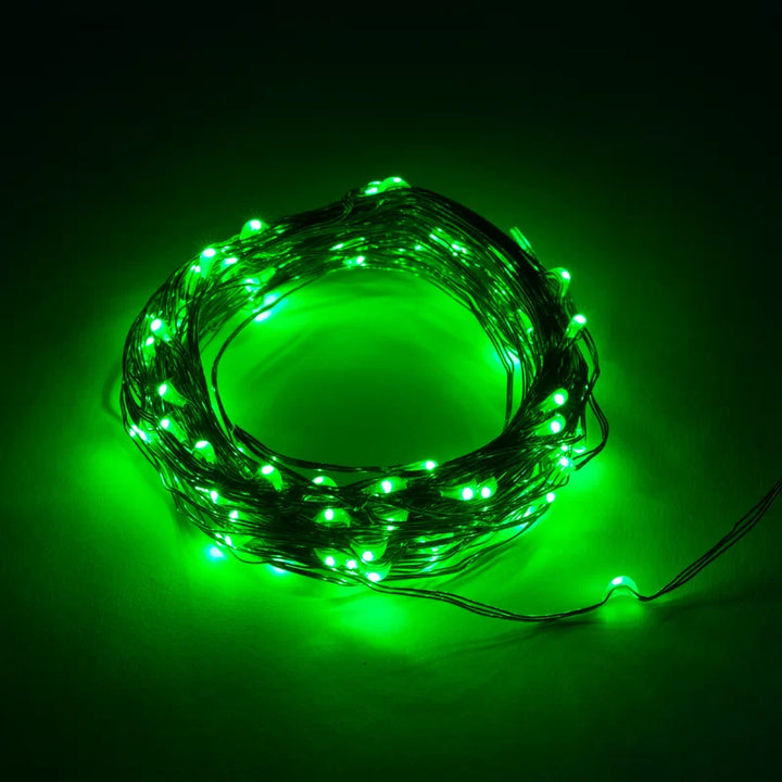 VibeCore copper fairy lights in green, creating a fresh, vibrant glow to add a cozy, nature-inspired ambiance to any space.