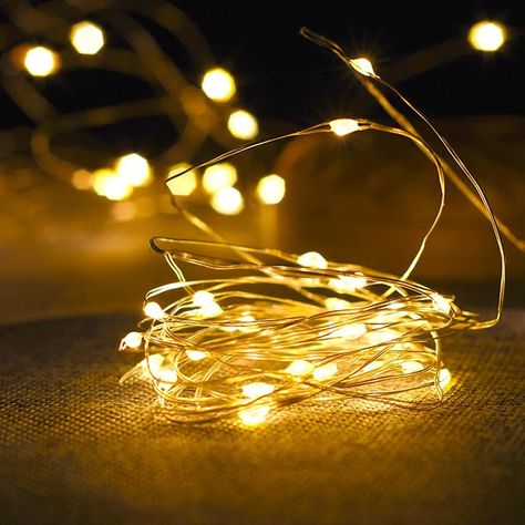 VibeCore copper fairy lights in warm white, malleable copper wire for customizable shapes, adding a cozy glow to any room. USB-powered for easy setup.
