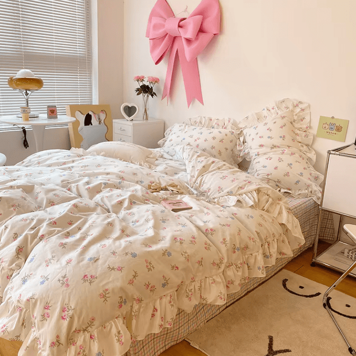 Full side view from the right angle of the 'Blossom French Ruffles Bedding Set,' displaying the soft, luxurious fabric with intricate French ruffles and floral details. The bedding exudes a coquette, romantic vibe, perfect for adding timeless elegance to any bedroom or dorm.