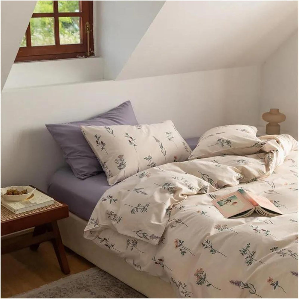 Side view of the VibeCore Cottagecore Gentle Blossom Duvet Cover Set, highlighting its soft, breathable cotton fabric and intricate floral design, perfect for creating a cozy, nature-inspired atmosphere in your bedroom or dorm.
