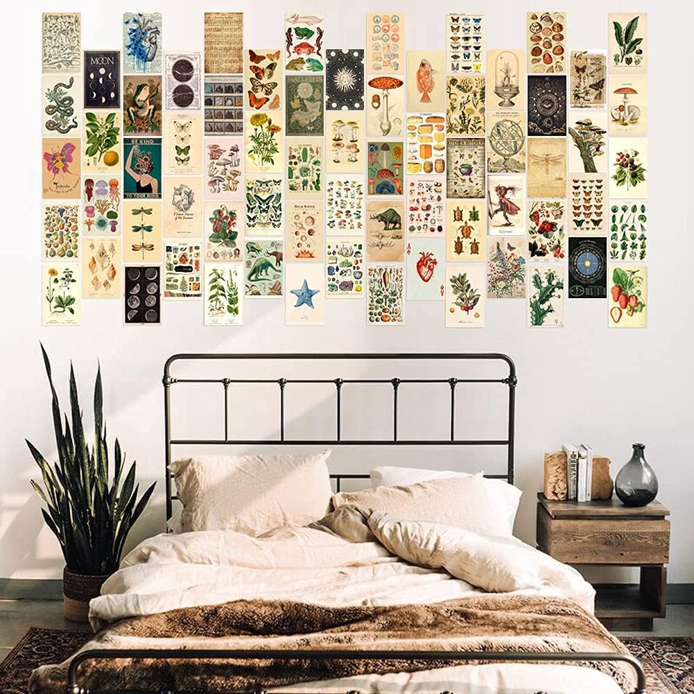 VibeCore Cottagecore Wall Collage Kit above bed featuring 70 vintage-inspired prints with delicate nature designs. Perfect for dorm room, bedroom, cottagecore decor, vintage wall art, nature-inspired, dreamy, and aesthetic bedroom styling.