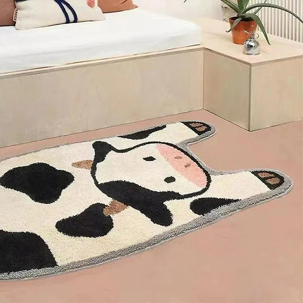 Close-up of the VibeCore Cow Accent Rug on the floor, highlighting its soft texture and charming cow design, perfect for adding warmth and character to the room.