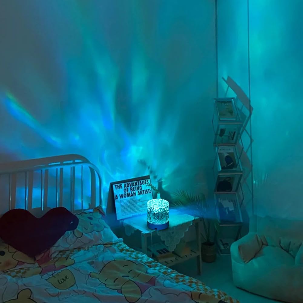 VibeCore Crystal Light Projector casting blue light in a bedroom, creating a calming, cozy atmosphere. With 16 vibrant color options, touch control, and USB rechargeability, this projector enhances aesthetic, mood lighting, and bedroom decor.