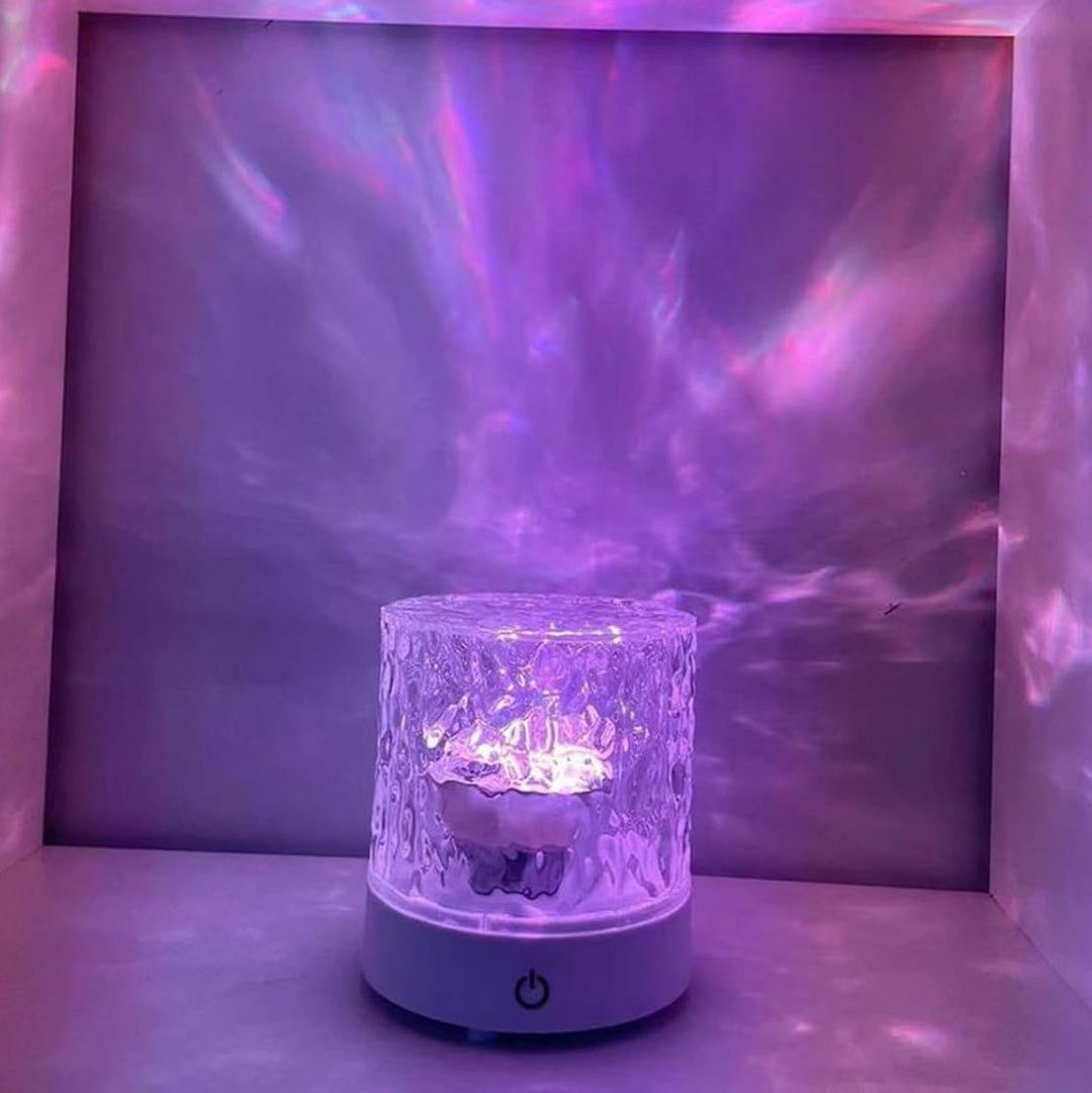 VibeCore Crystal Light Projector displaying purple light, showcasing its vibrant hue and sleek design. With 16 color options, touch control, and USB rechargeability, it adds a cozy, colorful glow to aesthetic, teen rooms, dorm rooms, and mood lighting setups.