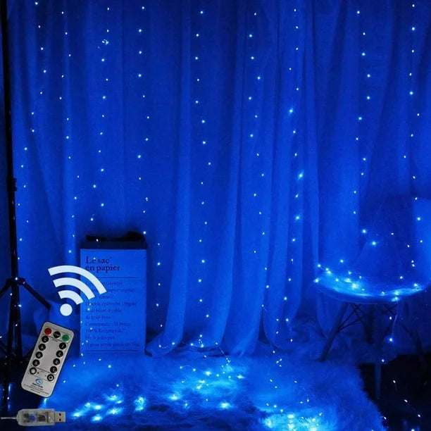 Blue curtain string lights hanging, adding a cool, ambient glow to the space.