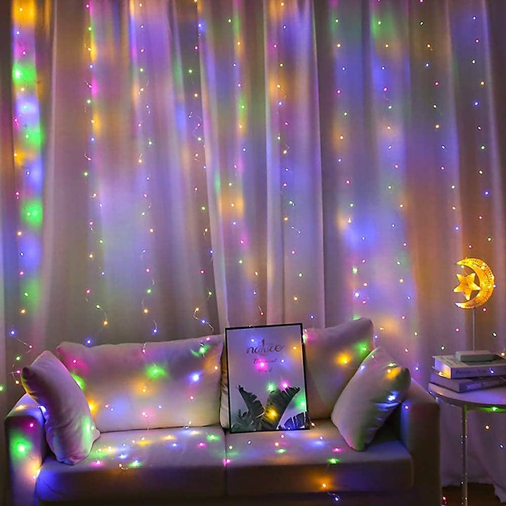 Multicolor curtain string lights hanging, adding vibrant, dynamic lighting to the space.