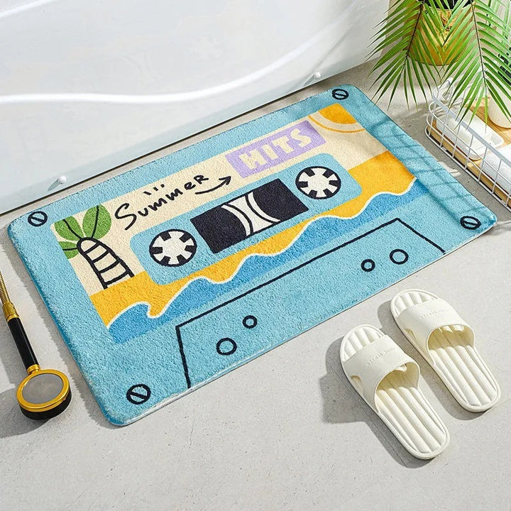 VibeCore Cute Cassette Accent Rug in blue, featuring a vibrant cassette tape design, soft and plush texture, and a non-slip backing for safety, perfect for adding a fun retro touch to any room.