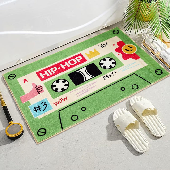 VibeCore Cute Cassette Accent Rug in green, featuring a vintage cassette tape design with a soft, plush texture and non-slip backing, perfect for adding a nostalgic touch to any room.