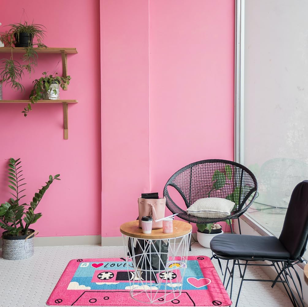 VibeCore Cute Cassette Accent Rug in pink, placed on the floor, showcasing a retro cassette tape design with vibrant colors and a plush texture. Perfect for adding a nostalgic, playful touch to any room with its non-slip backing for safety.