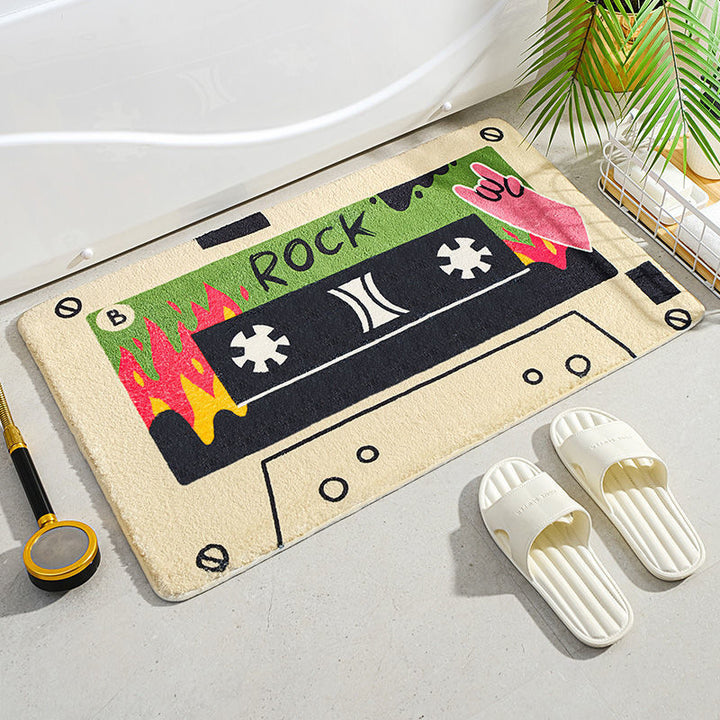 VibeCore Cute Cassette Accent Rug with a "Rock and Roll" design, featuring a retro cassette tape graphic in bold colors, perfect for adding a fun, music-inspired vibe to your space with a soft, plush texture and non-slip backing.