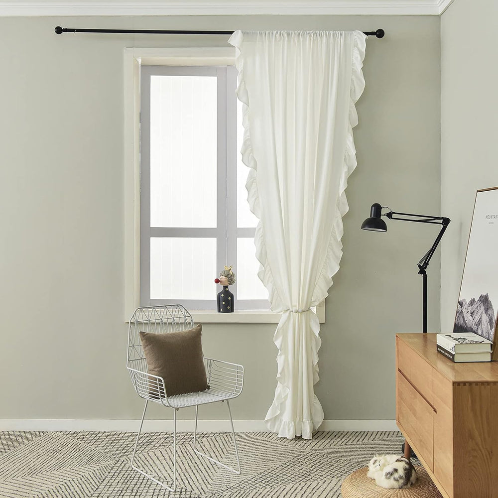 VibeCore Delicate Ruffles Curtain in white, tied back to reveal soft fabric with ruffle detailing, hanging gracefully in a room.