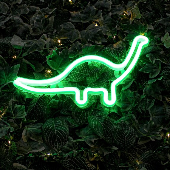 Aesthetic VibeCore Dinosaur Neon Light on boxwood, USB or battery-powered LED sign for trendy bedroom, dorm, or game room decor, adding a fun, bold glow to elevate your space.