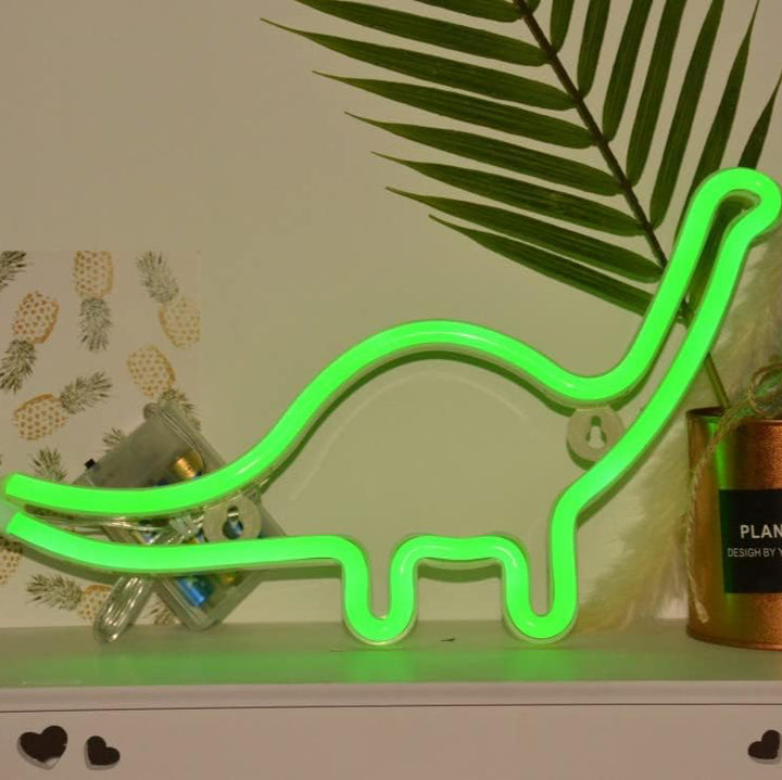 Aesthetic VibeCore Dinosaur Neon Light on a dresser, USB or battery-powered LED sign for trendy bedroom or dorm decor, adding a fun, bold glow to elevate your space.