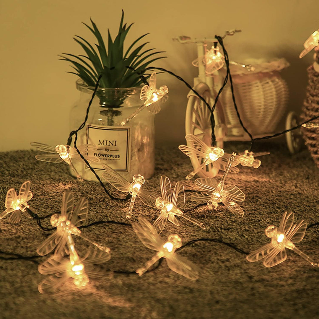 Elegant dragonfly LED string lights with a warm white glow, creating a cozy and magical ambiance. Perfect for home, dorm, or party decor.