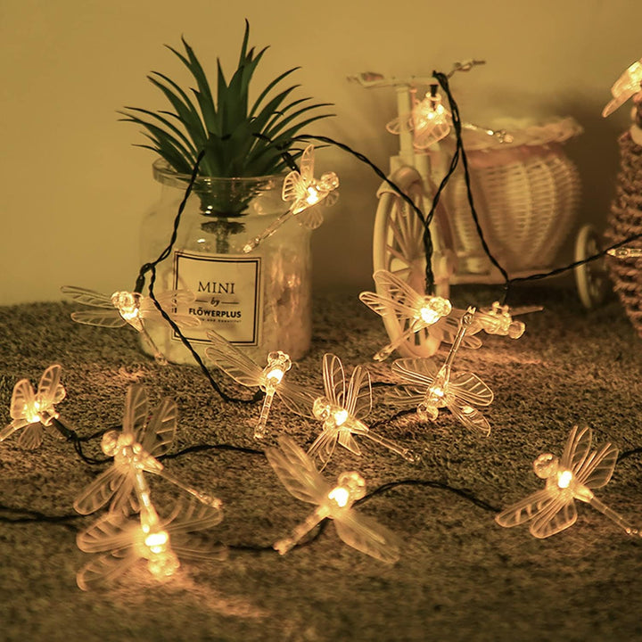 Elegant dragonfly LED string lights with a warm white glow, creating a cozy and magical ambiance. Perfect for home, dorm, or party decor.