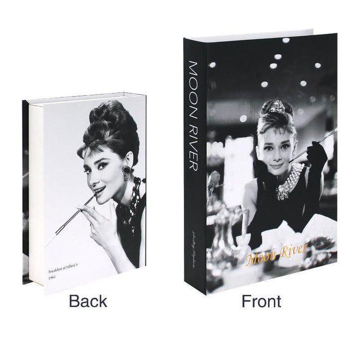 VibeCore Fashion Fake Book Storage Box on Coffee Table, featuring a chic design that looks like a stylish coffee table book, used for storing small items such as jewelry, stationery, or keepsakes, blending seamlessly into the decor of a living room or office.