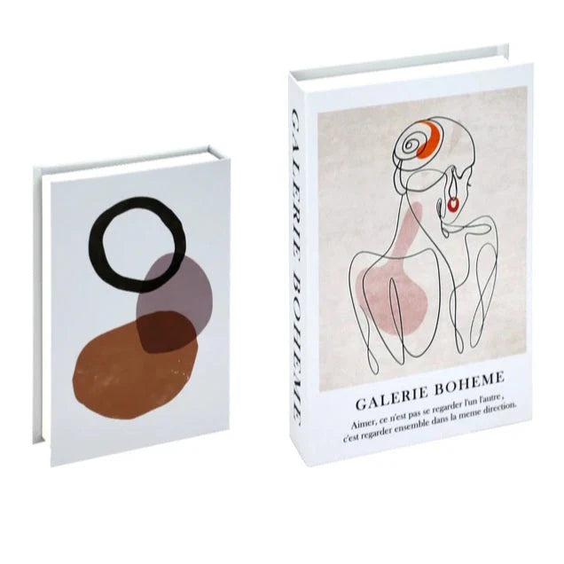 VibeCore Fashion Fake Book Storage Box on Coffee Table, featuring a chic design that looks like a stylish coffee table book, used for storing small items such as jewelry, stationery, or keepsakes, blending seamlessly into the decor of a living room or office.