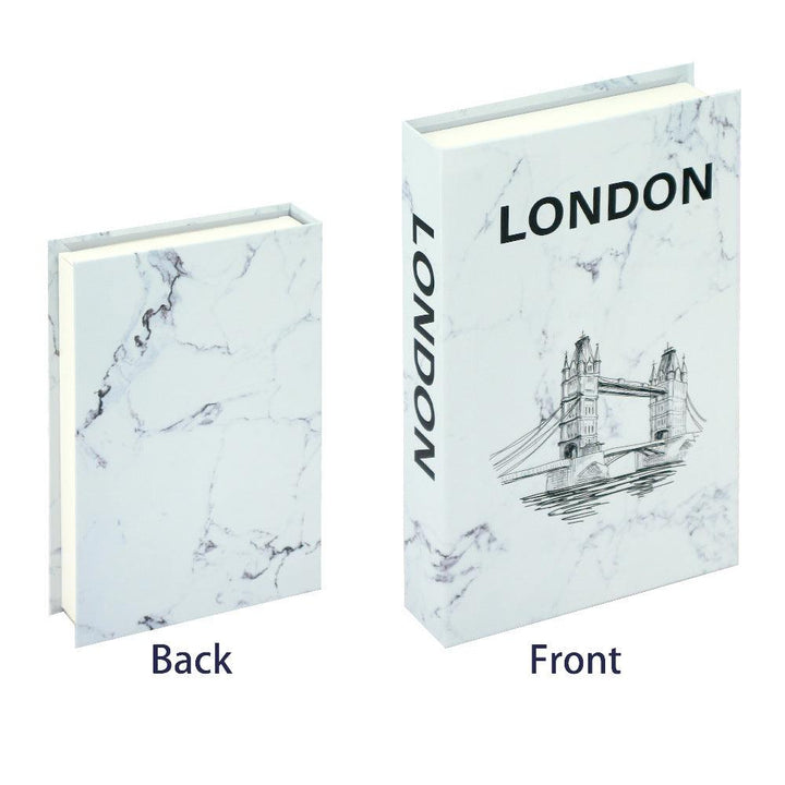 VibeCore Fashion Fake Book Storage Box on Coffee Table, featuring a chic design that looks like a stylish coffee table book, used for storing small items such as jewelry, stationery, or keepsakes, blending seamlessly into the decor of a living room or office.