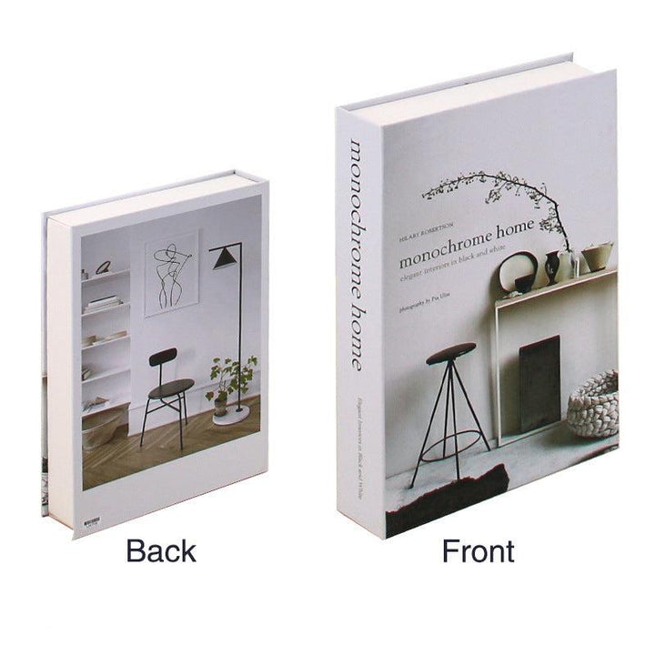 VibeCore Fashion Fake Book Storage Box on Coffee Table, featuring a chic design that looks like a stylish coffee table book, used for storing small items such as jewelry, stationery, or keepsakes, blending seamlessly into the decor of a living room or office.