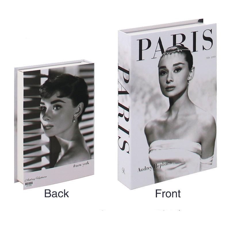 VibeCore Fashion Fake Book Storage Box on Coffee Table, featuring a chic design that looks like a stylish coffee table book, used for storing small items such as jewelry, stationery, or keepsakes, blending seamlessly into the decor of a living room or office.