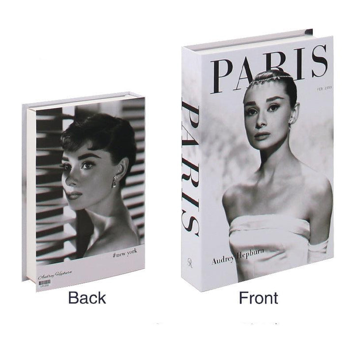VibeCore Fashion Fake Book Storage Box on Coffee Table, featuring a chic design that looks like a stylish coffee table book, used for storing small items such as jewelry, stationery, or keepsakes, blending seamlessly into the decor of a living room or office.