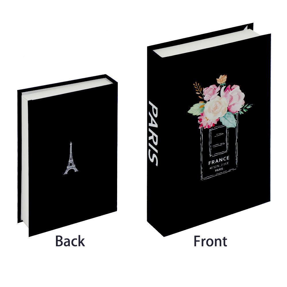 VibeCore Fashion Fake Book Storage Box on Coffee Table, featuring a chic design that looks like a stylish coffee table book, used for storing small items such as jewelry, stationery, or keepsakes, blending seamlessly into the decor of a living room or office.