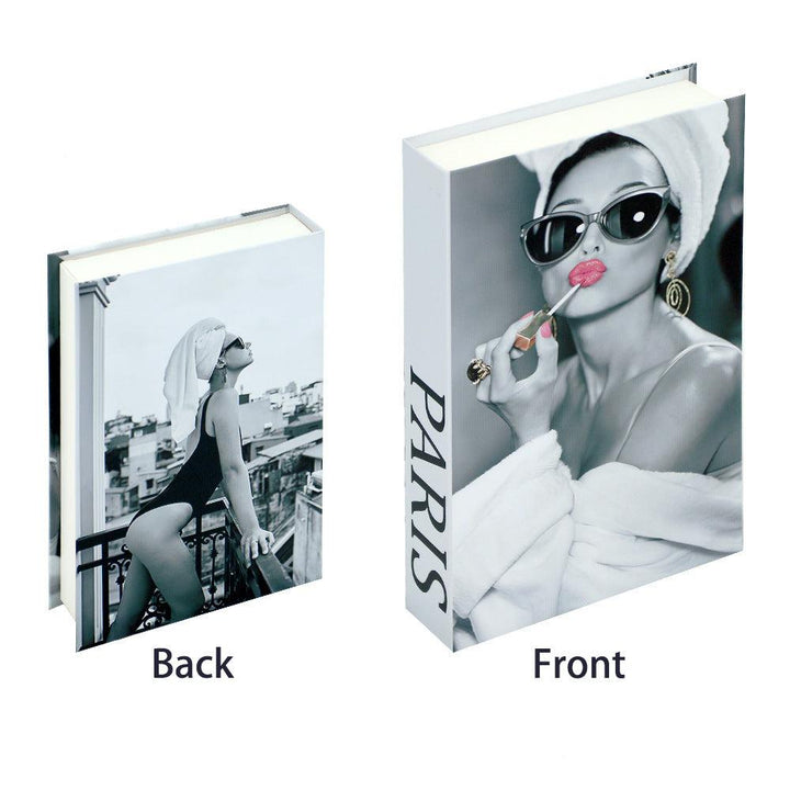VibeCore Fashion Fake Book Storage Box on Coffee Table, featuring a chic design that looks like a stylish coffee table book, used for storing small items such as jewelry, stationery, or keepsakes, blending seamlessly into the decor of a living room or office.