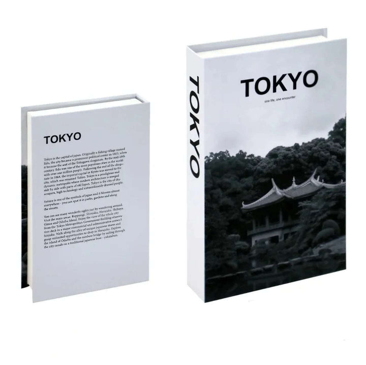VibeCore Fashion Fake Book Storage Box on Coffee Table, featuring a chic design that looks like a stylish coffee table book, used for storing small items such as jewelry, stationery, or keepsakes, blending seamlessly into the decor of a living room or office.