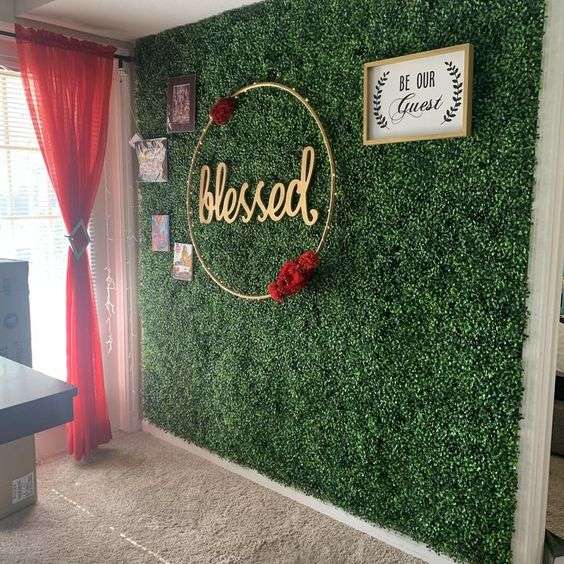 Aesthetic faux boxwood plant wall decoration on a home wall featuring lush greenery and realistic texture perfect for indoor and outdoor decor low-maintenance and easy to install