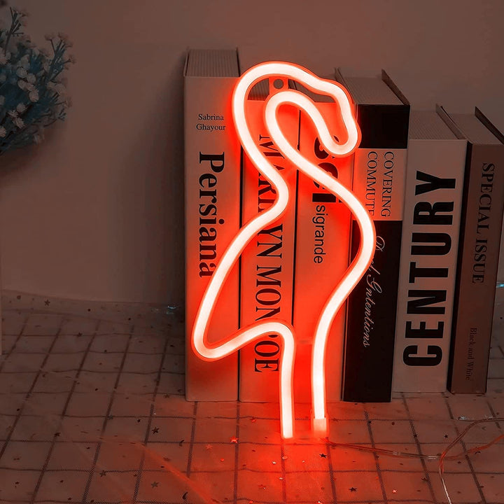 VibeCore Flamingo Neon Light Red Against Books