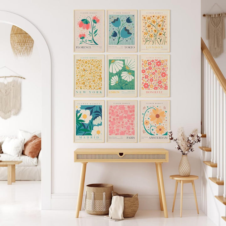 "VibeCore Flower Market Cities Canvas Posters" featuring a collage of vibrant floral prints from iconic cities such as Tokyo, Madrid, Amsterdam, and London. These botanical-inspired artworks bring the beauty of flower markets to your walls, adding a lively, nature-filled charm to any room's decor.