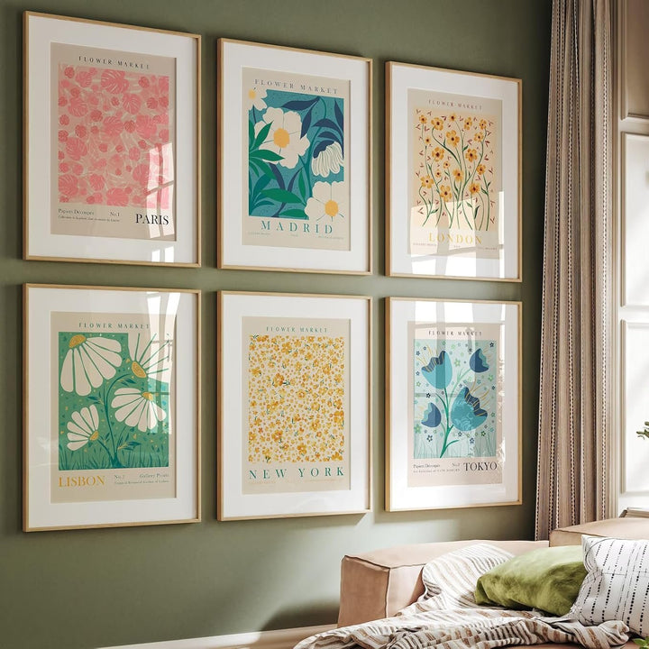 "VibeCore Flower Market Cities Canvas Posters" featuring a framed gallery of vibrant floral prints from iconic cities like Tokyo, Madrid, Amsterdam, and London. These colorful botanical artworks bring the charm of bustling flower markets into any room, offering a sophisticated, nature-inspired aesthetic for bedrooms, dorms, or apartments.