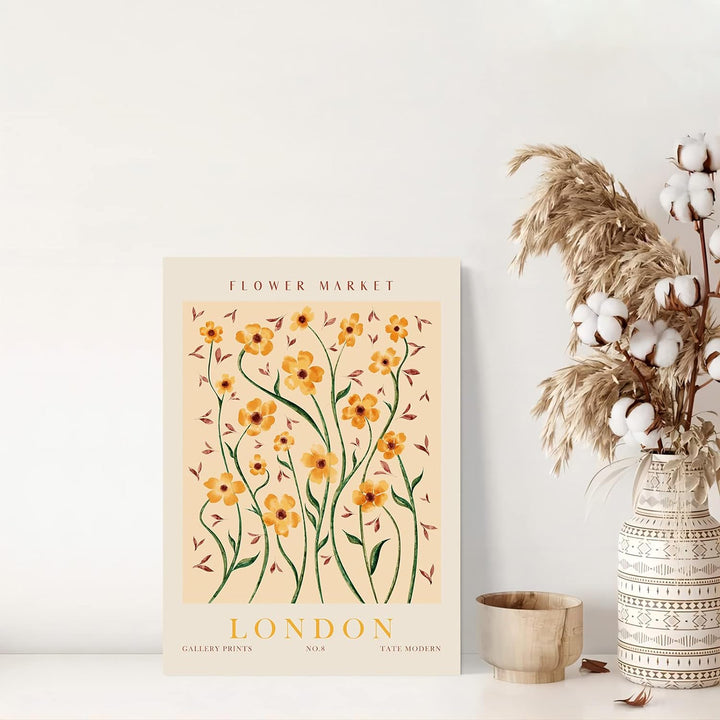 "VibeCore Flower Market Cities Canvas Posters" featuring a colorful floral print inspired by London's iconic flower markets. The vibrant design captures the charm and vibrancy of the city, with an array of blooms evoking a lively, fresh atmosphere. Perfect for adding a touch of British floral elegance and nature-inspired beauty to your space.