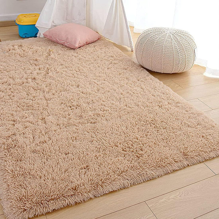 Close-up of the VibeCore Fluffy Area Rug in Beige, showcasing its soft, plush texture and luxurious feel, perfect for adding warmth and comfort to any room.
