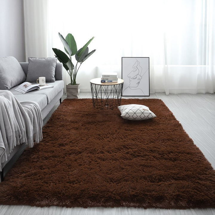 VibeCore Fluffy Area Rug in Brown, adding warmth and a cozy feel to any space with its soft texture and rich, earthy tone. Perfect for living rooms or bedrooms.