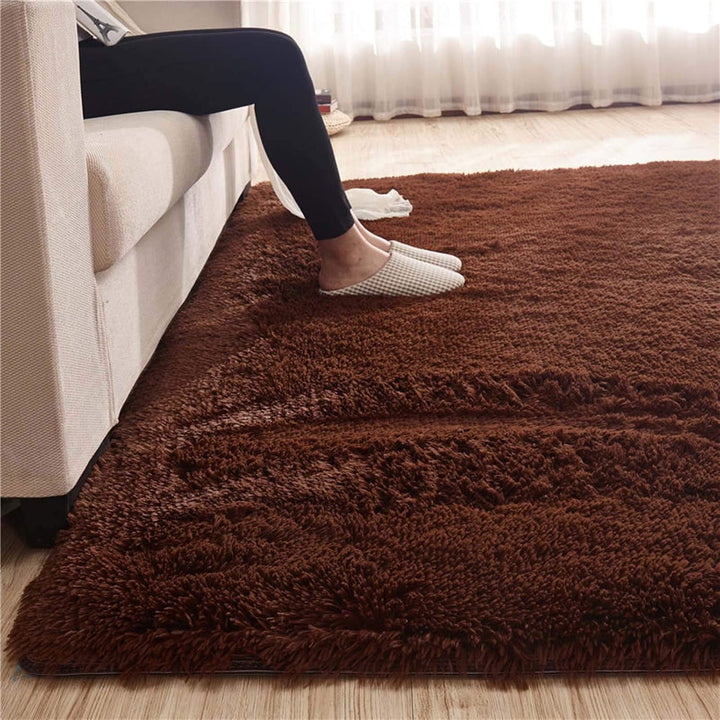 Close-up view of the VibeCore Fluffy Area Rug in Brown, showcasing its soft texture and rich, earthy color that adds warmth and comfort to your space.