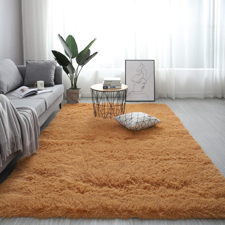 VibeCore Fluffy Area Rug in Camel, featuring a cozy and plush texture, laid out on the floor in a warm, inviting space with a neutral, earthy tone.
