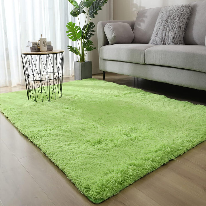 VibeCore Fluffy Area Rug in Green, placed in a cozy living room setting, adding a touch of warmth and comfort to the space.